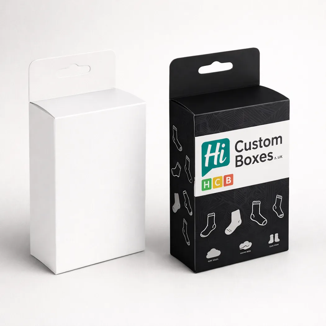 Vertical hanging display boxes with somber black patterns and a clear white branding panel- class=